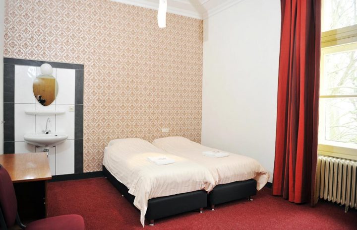 Een slaapkamer op het landgoed van De Berckt